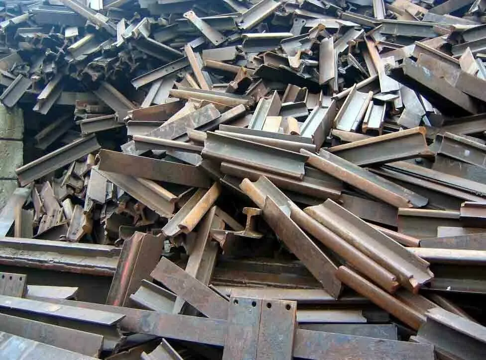 Metal scrap recycling yard in Jeddah – high-quality image showing piles of scrap metal ready for recycling.